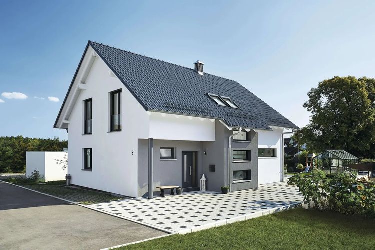 Modernes Weberhaus Fertighaus mit Satteldach und Putzfassade