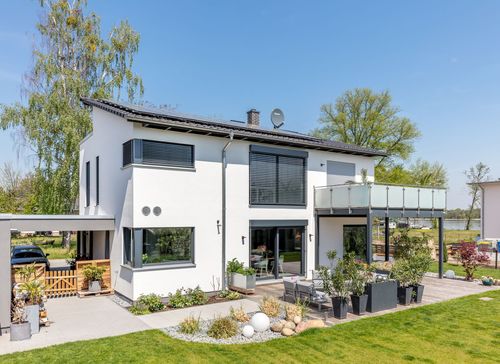 Pult-/Flachdach-Haus mit Carport und Garage - Slideshow-Bild 1